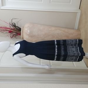 This gorgeous short sleeve dress takes you into summer